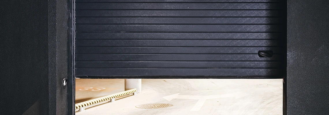 Residential Black Garage Door Installation in Lehigh Acres, FL